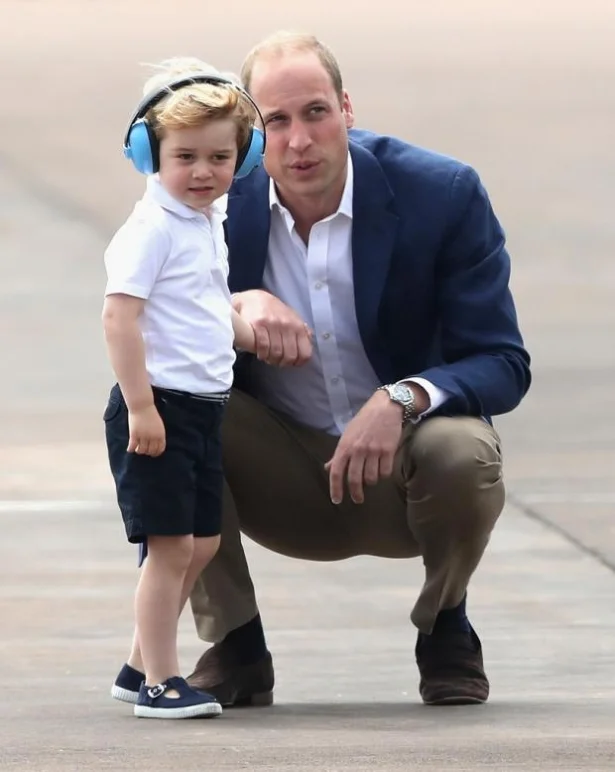 Принц Вільям з сином Джорджем - фото 339854