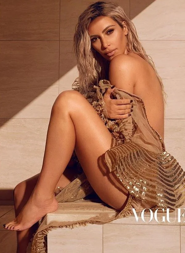 Кім Кардашьян знялася для Vogue та опинилася в центрі скандалу - фото 372263