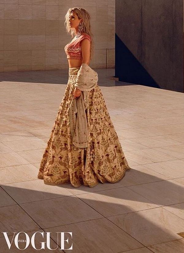 Ким Кардашьян снялась для Vogue и оказалась в центре скандала - фото 372264