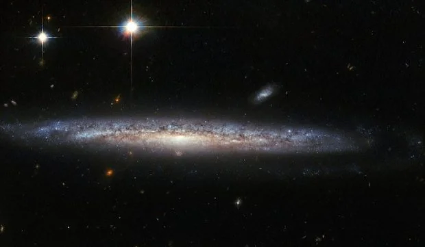 NASA показало над'яскравий спалах і зіткнення двох галактик - фото 376737