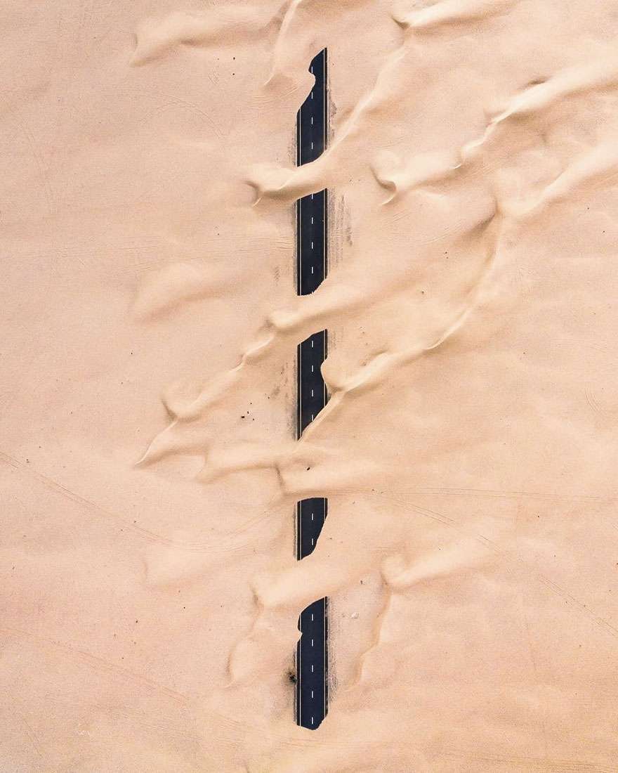 Уникальные фото Арабских Эмиратов с высоты показывают, как пустыня захватывает все вокруг - фото 388640