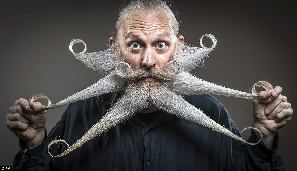 Британські чоловіки позмагались за звання найкрасивішого власника вусів та бороди - фото 398709