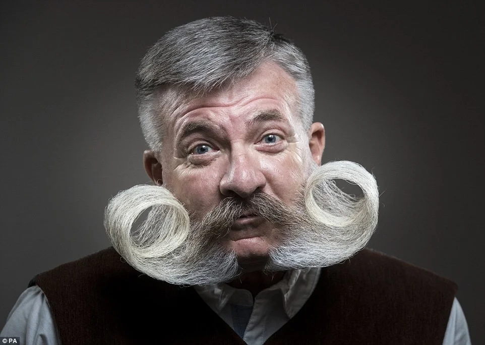 Британські чоловіки позмагались за звання найкрасивішого власника вусів та бороди - фото 398710