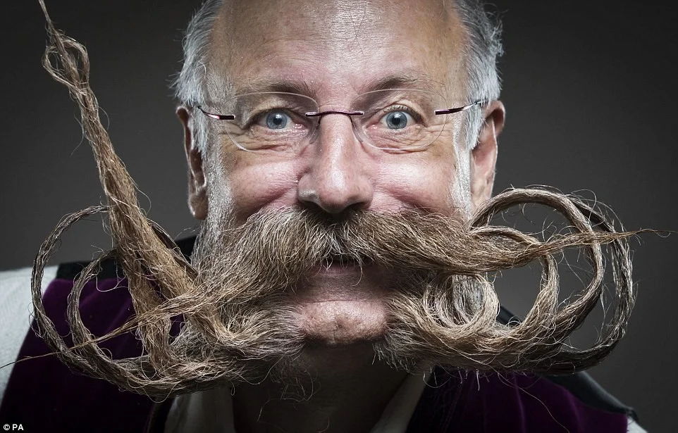 Британські чоловіки позмагались за звання найкрасивішого власника вусів та бороди - фото 398712