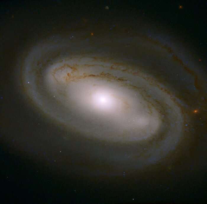 NASA показало снимок галактики, что напоминает чашку с латте - фото 479164