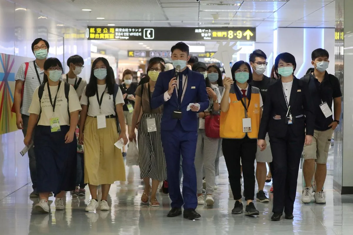 В Тайване придумали, как развлечь скучающих туристов - фейковые полеты - фото 483474