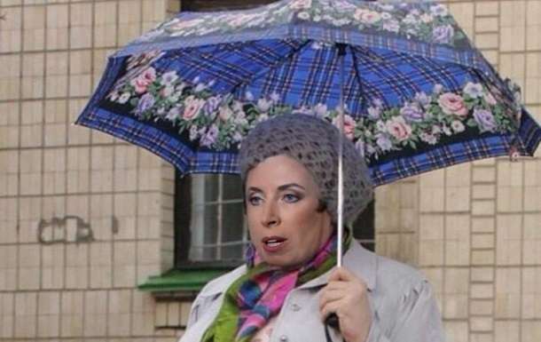 В мережі ширяться меми з українською депутаткою, яка політала на парасольці - фото 489946