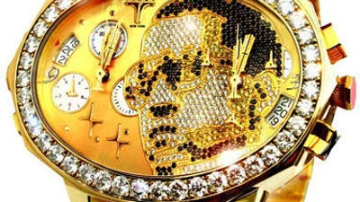 Известный репер купил золотые часы со своим портретом
