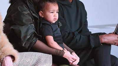 Ким Кардашьян с дочкой на показе коллекции Канье Уэста для Adidas Originals