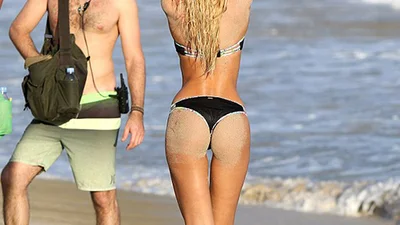 Первые фото с фотосессии Кэндис Свейнпол в бикини