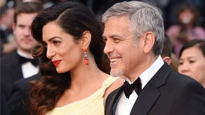Закохані Джордж і Амаль Клуні залюбки позують в Каннах