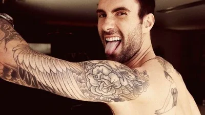 Адам Левін пішов зі сцени заради дружини