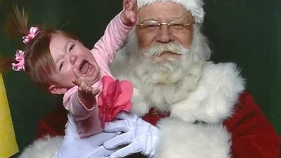 Дитячий жах: кумедні фото малюків із Санта-Клаусами