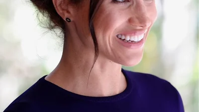 Меган Маркл засвітила чималий животик у тісній сукні