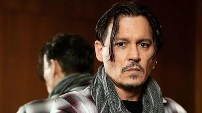 Все обсуждают страстные поцелуи 55-летнего Джонни Деппа с юной девушкой