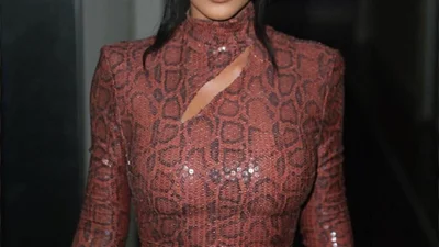 Кім Кардашьян в прозорому комбінезоні не може залишити в спокої леопардовий принт