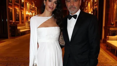 Чарівні Амаль і Джордж Клуні відвідали Букінгемський палац