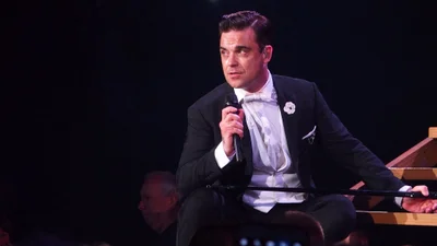 Робби Уильямс устроил частный концерт своему двухмесячному сынишке, и это такая милота