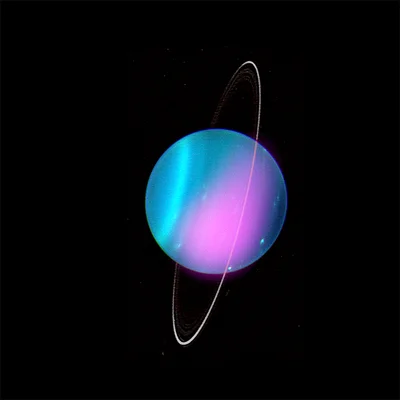 Астрономы показали первые фото Урана, на которых видно его свечение - фото 511108