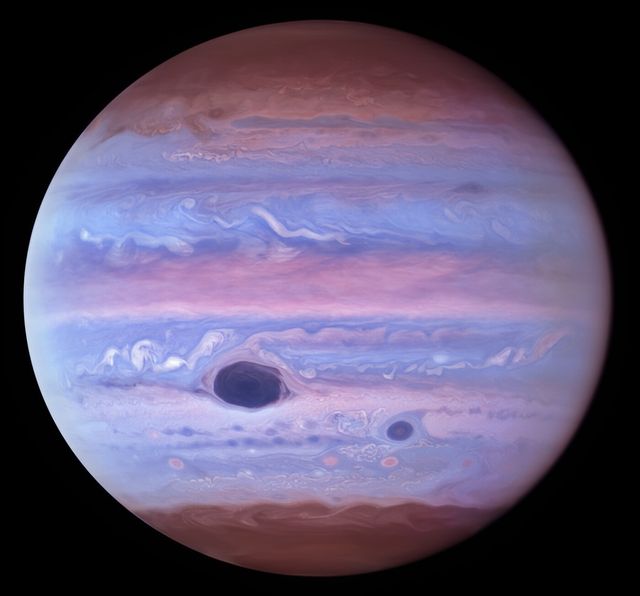 В новому світлі: телескоп Hubble зробив нові і незвичні фото Юпітера - фото 514464