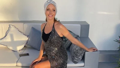 Вагітна Катя Осадча вдягнула обтислу вечірню сукню і підкреслила животик