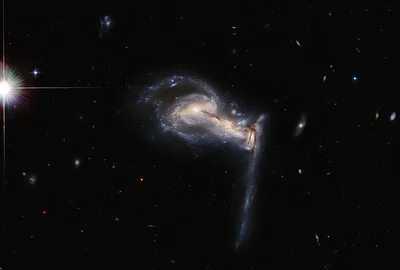 Телескоп Габбл зробив вражаюче фото з трьома галактиками - фото 520106