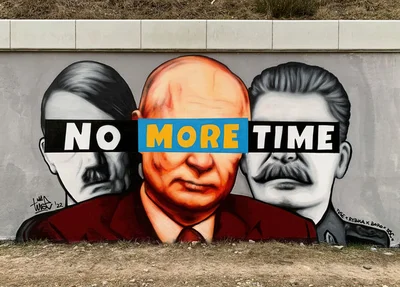 В Польше появился новый рисунок с Путиным и его кумирами - фото 540768