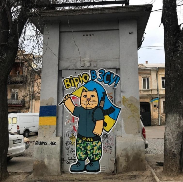 Патриотические котики: Одессу украсили граффити с котиками, которые дают тягла агрессору - фото 543369