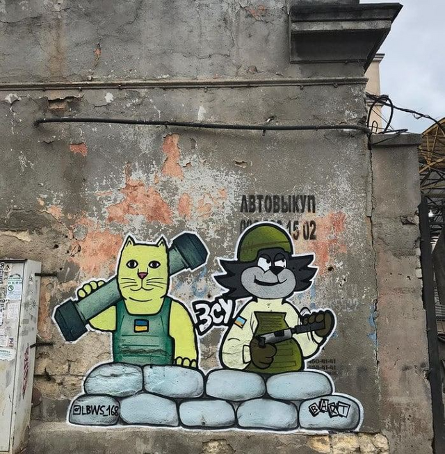 Патриотические котики: Одессу украсили граффити с котиками, которые дают тягла агрессору - фото 543371