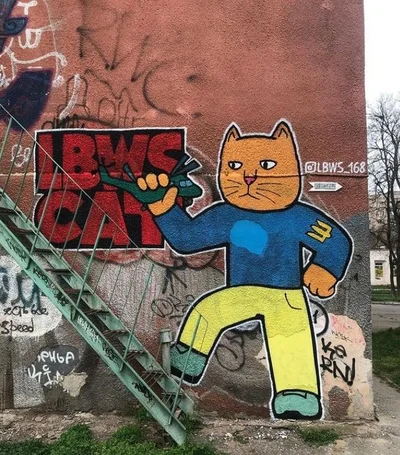 Патриотические котики: Одессу украсили граффити с котиками, которые дают тягла агрессору - фото 543373