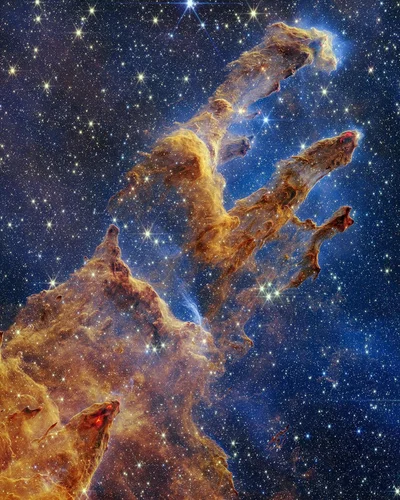 Джеймс Вэбб поделился новыми фото – причудливыми снимками Столпов творения во Вселенной - фото 550008