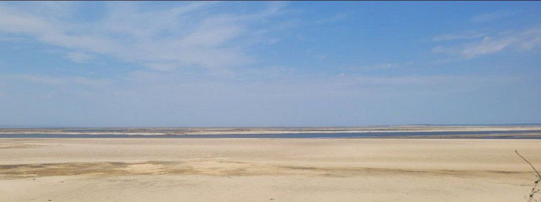 Дно Каховского водохранилища превращается в пустыню: щемящие фото - фото 561216