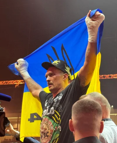 Олександр Усик переміг Тайсона Ф'юрі - фото 614149