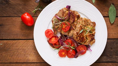 Найкращий рецепт запеченої свинини з помідорами