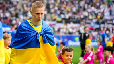 Зинченко показал на матче футболку с номером 1000 и признался, чья это была идея