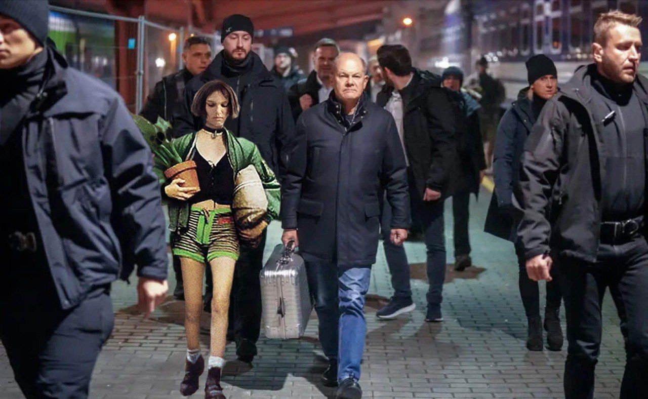 Что в чемодане Шольца: смотри мемы о визите канцлера Германии в Киев - фото 663400