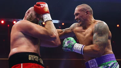 Як Усик переміг Ф'юрі у надскладному бою – дивіться фото і відео тріумфальних моментів
