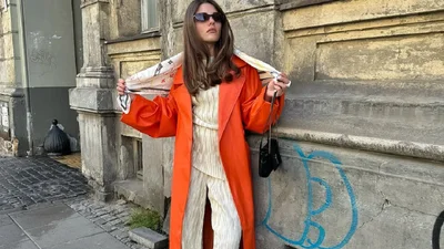 Оранжевый - главный акцент осени 2025: Андре Тан показал, как его носить стильно