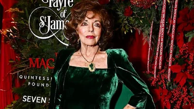 92-летняя Джоан Коллинз в колготах в сеточку зажгла красную дорожку со своим молодым человеком