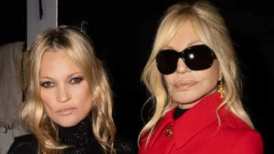 Донателла Версаче у пальті Gucci прийшла підтримати нового дизайнера цього модного дому