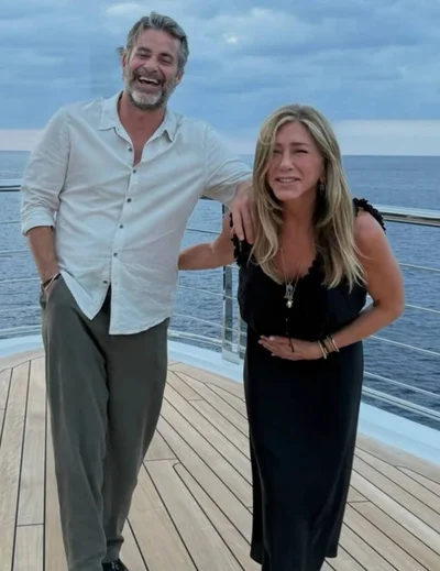 Дженніфер Еністон та Джим Кертіс - фото 843882